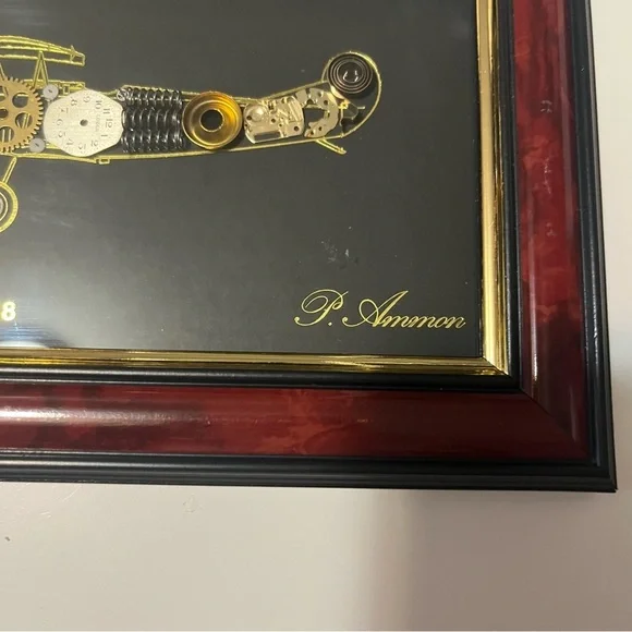 framed piece of art featuring a representation of an airplane with clock pieces - Picture 5 of 10